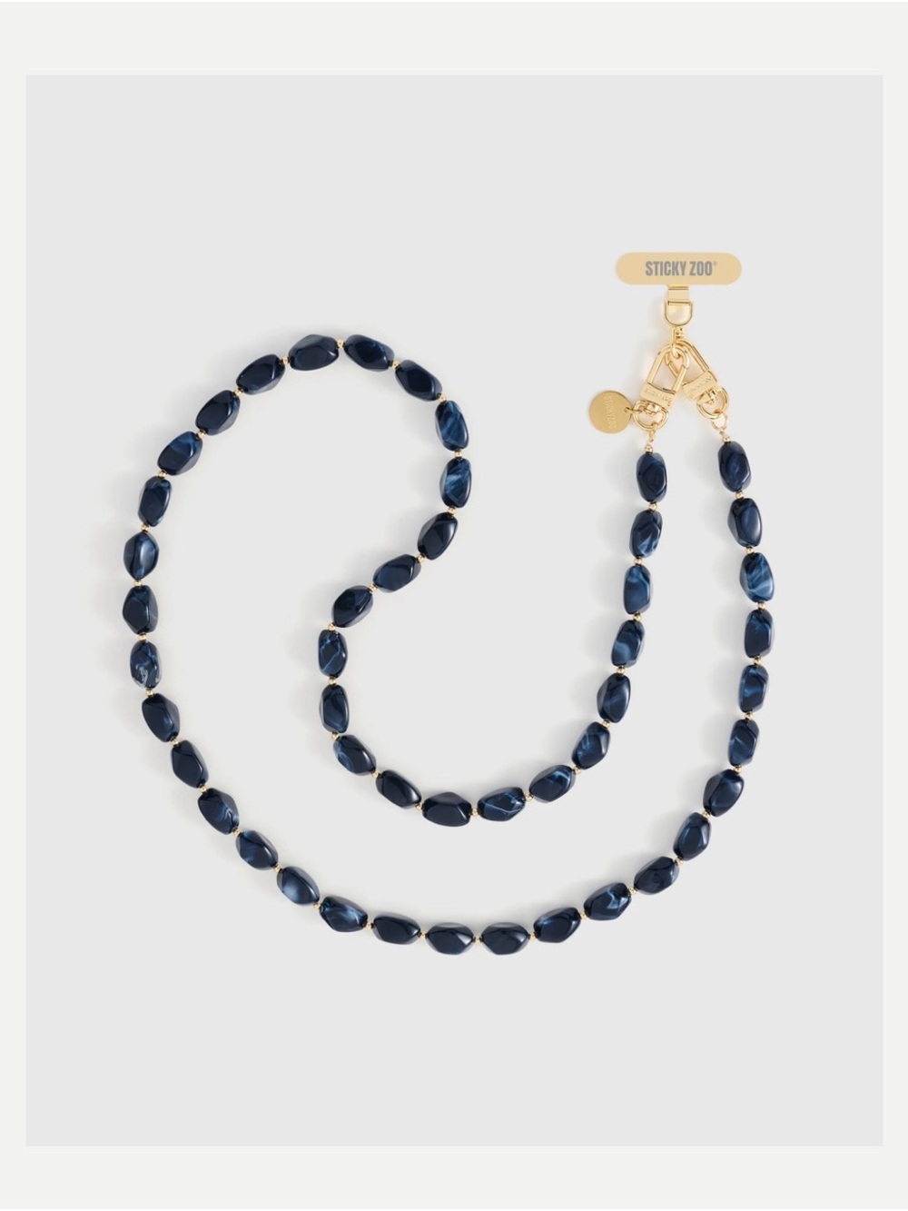 ROMY ORBIT CROSS-BODY PHONE STRAP — NAVY